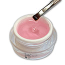 Foto di gel costruttore builder monofasico 3 in 1 moonlight da 15ml colore rosè con pennello con sfondo bianco, marchio SNC Super Nail Center